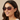 Mujer chilena luciendo Lentes de Sol Vogue VO5625S - Imagen lifestyle